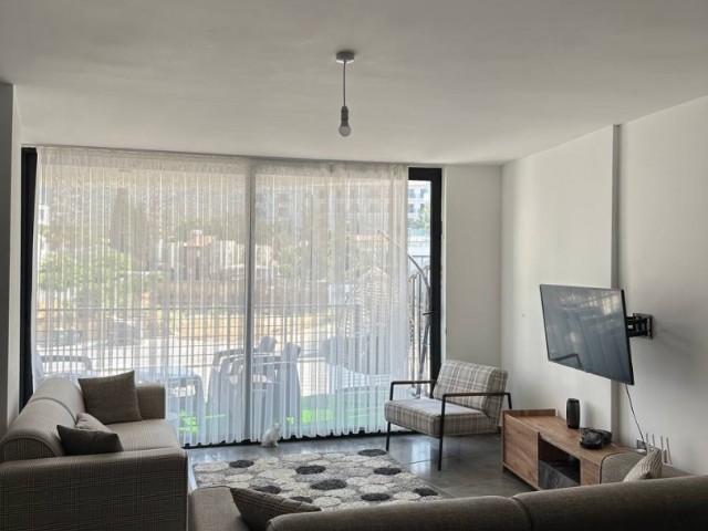 2+1 Flat with Sea View in Kyrenia, with Terrace, Private Parking, Common Pool and Gym, High Rental Return for Investment
