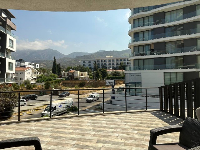 2+1 Flat with Sea View in Kyrenia, with Terrace, Private Parking, Common Pool and Gym, High Rental Return for Investment