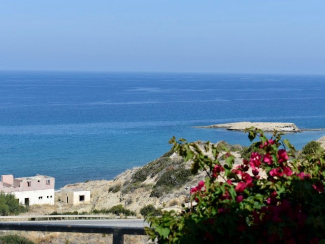 3+1 WOHNUNG ZUM VERKAUF IN GIRNE ESENTEPE CARINGTON, AUF EINEM GRUNDSTÜCK MIT MEERBLICK UND ALLEN AR