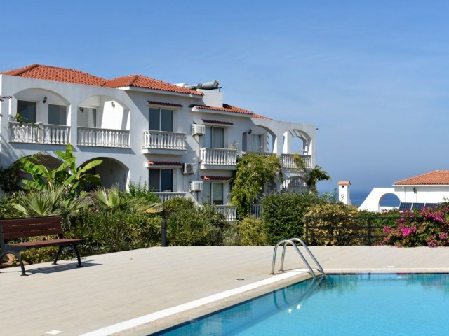 3+1 FLAT FOR SALE IN GIRNE ESENTEPE CARINGTON, ON A SITE WITH SEA VIEW AND ALL KINDS OF SOCIAL FACILITIES WITH POOL