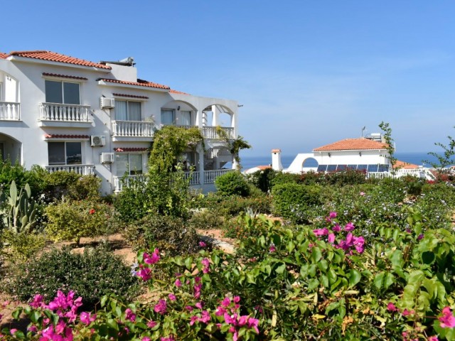 3+1 FLAT FOR SALE IN GIRNE ESENTEPE CARINGTON, ON A SITE WITH SEA VIEW AND ALL KINDS OF SOCIAL FACILITIES WITH POOL