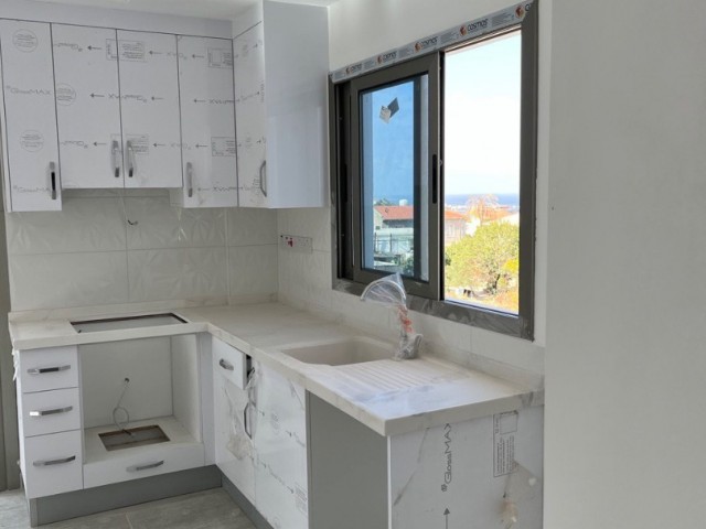 1+1 NEW FLAT WITH MOUNTAIN AND SEA VIEW FOR SALE IN GIRNE ALSANCAK