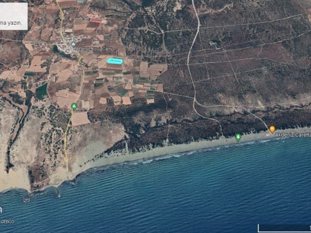 8.5 DECLARES OF GREAT INVESTMENT LAND IN GIRNE MEDITERRANEAN VILLAGE, NO ROADS OR DEVELOPMENT CURRENTLY, LAND WITH AN OPPORTUNITY FOR THE FUTURE