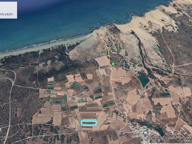8.5 DECLARES OF GREAT INVESTMENT LAND IN GIRNE MEDITERRANEAN VILLAGE, NO ROADS OR DEVELOPMENT CURRENTLY, LAND WITH AN OPPORTUNITY FOR THE FUTURE
