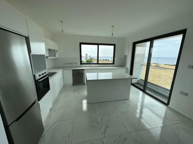 3+1 NEW PENTHOUSE WITH MOUNTAIN AND SEA VIEW FOR SALE IN GIRNE ESENTEPE WITH PRIVATE TERRACE, FULLY EQUIPPED AND CHIC DESIGN, VAT PAID