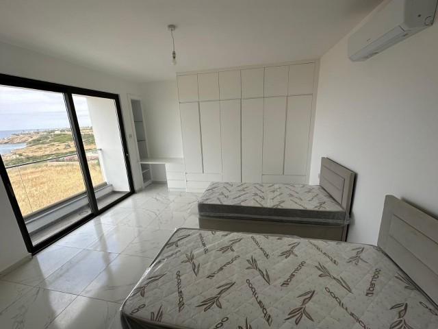 3+1 NEW PENTHOUSE WITH MOUNTAIN AND SEA VIEW FOR SALE IN GIRNE ESENTEPE WITH PRIVATE TERRACE, FULLY EQUIPPED AND CHIC DESIGN, VAT PAID