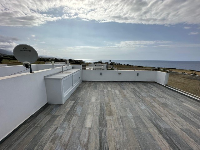 3+1 NEW PENTHOUSE WITH MOUNTAIN AND SEA VIEW FOR SALE IN GIRNE ESENTEPE WITH PRIVATE TERRACE, FULLY EQUIPPED AND CHIC DESIGN, VAT PAID