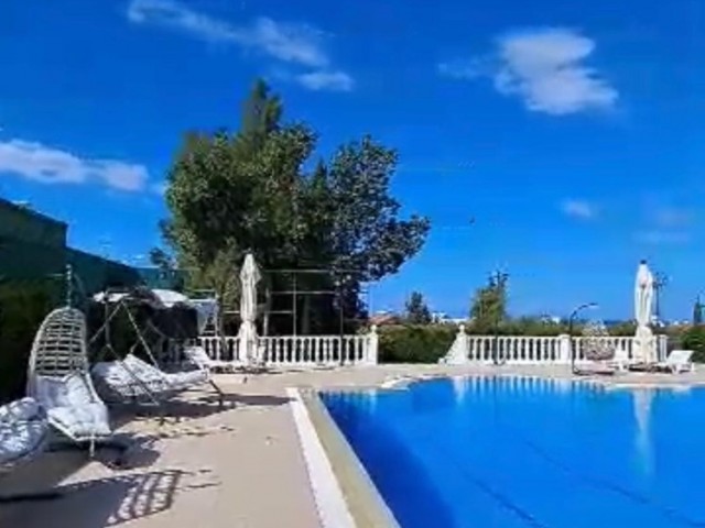 ULTRA LUX VILLA FOR SALE IN GIRNE ÇATALKÖY REGION IS LOCATED ON 4 DECLARES AND HAS 15 ROOMS AND 17 BATHROOMS.