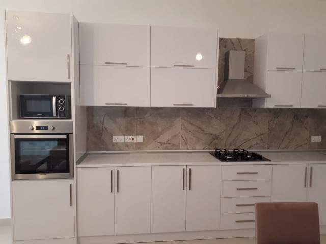 Site with pool, 3+1 fully furnished, brand new flat in Zeytinlik....2 dept, 1 rent, 1 commission