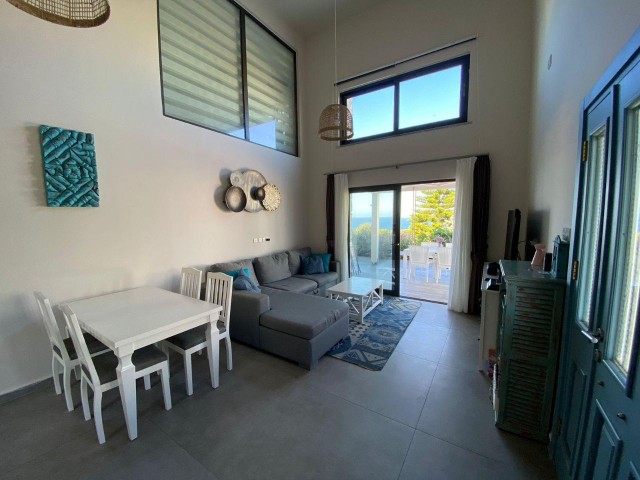 2+1 LOFT FLAT FOR SALE IN A QUIET ENVIRONMENT IN GIRNE ESNTEPE FULLY FURNISHED WITH SHARED POOL