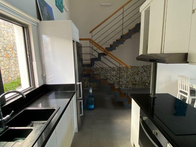 2+1 LOFT FLAT FOR SALE IN A QUIET ENVIRONMENT IN GIRNE ESNTEPE FULLY FURNISHED WITH SHARED POOL