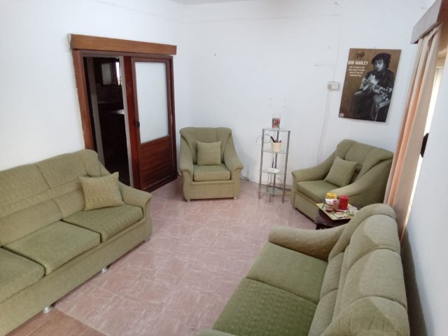 MAGOSA ECE UN 15 AĞUSTOZ BOULEVARD WITH DETACHED GARAGE, GARDEN AND BOLKON WITH 266 M2 TOTAL LAND WITH HALF FURNISHED AND OPEN TO BARTER FOR SALE WITH CONDITION OF BEING A APARTMENT FLOOR