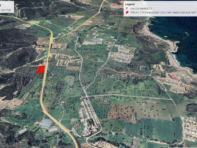 7 DECLARES OF LAND FOR SALE WITH SEA VIEW IN TATLISU WITH OFFICIAL ROAD WITH 35% ZONING ADEM AKIN 05