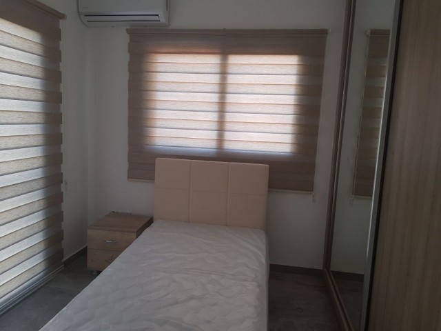 Girne Üniversitesi'ne yürüyüş mesafesinde 2 yatak odalı zemin kat  eşyalı kiralık daireler.. 0533 871 14 90 