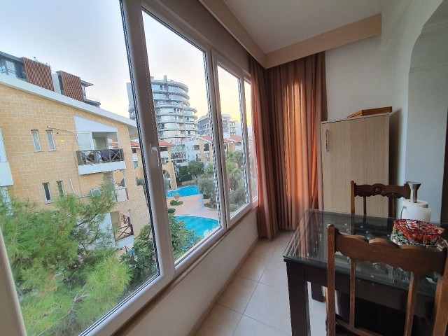 Kyrenia Center; Newly furnished spacious apartment in a complex with communal pool
