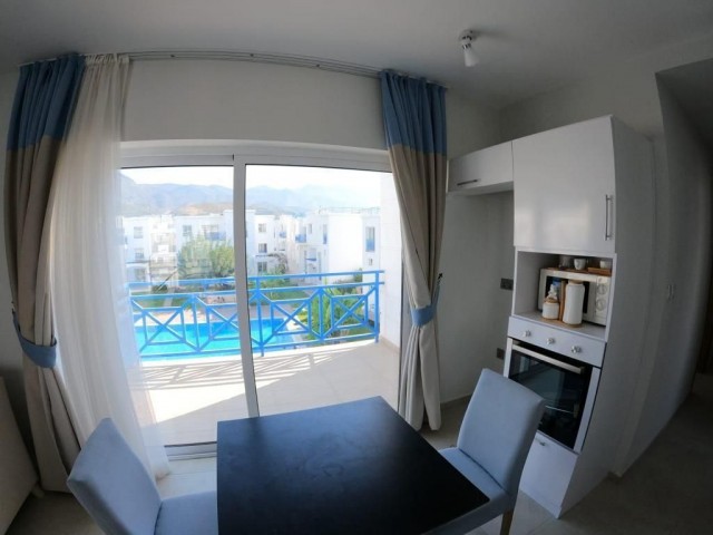 Kyrenia Alsancak; Furnished Apartment with Mountain Sea View in a Site with Shared Pool