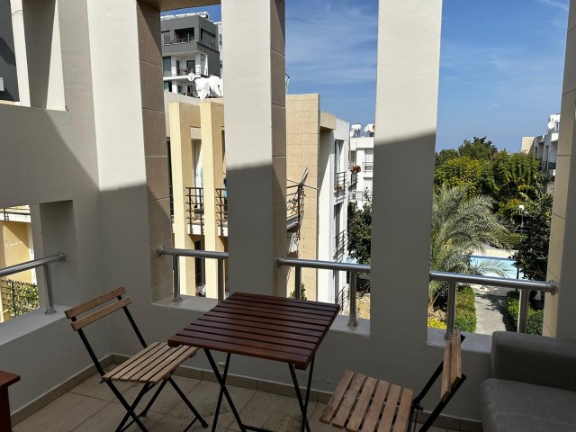 Kyrenia Center; Fully Furnished Apartment with Balcony in a Site with Shared Pool