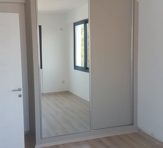 Yenikent'te Belediye Binası arkası 2+1 lüks 90m2 ara kat daire.