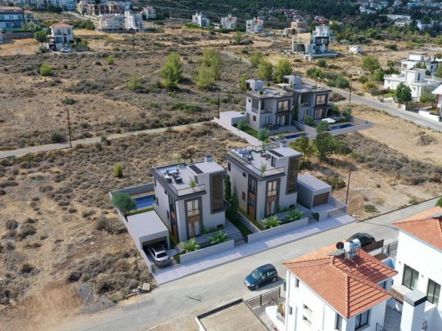 High-rise villas with mountain and sea views and private pools in Çatalköy.