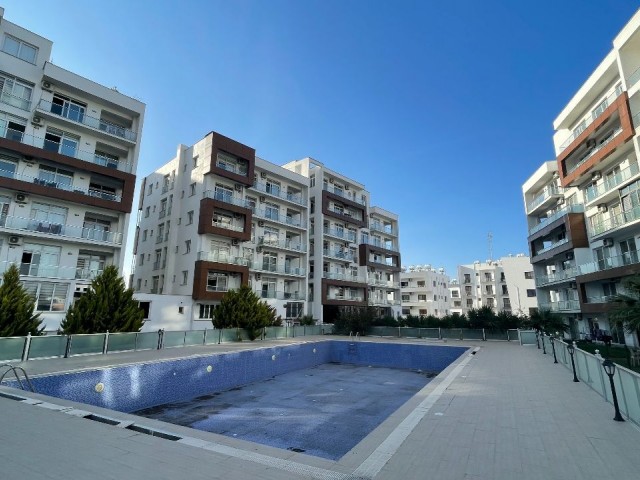 2+1 FLATS FOR SALE WITH COMMON POOL IN LEFKE / GEMİKONAĞI CENTER, FOR LIVING AND INVESTMENT