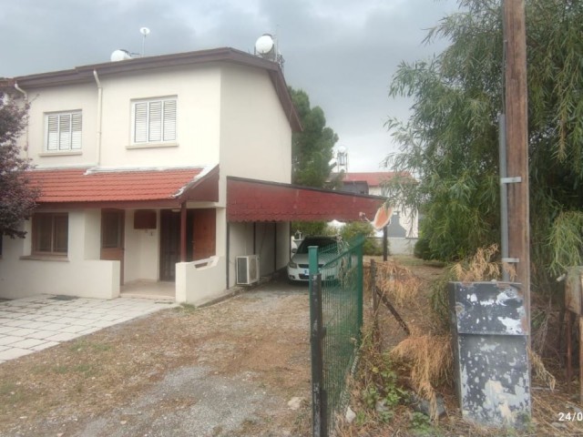 Located on the main road, on the corner, in Taşkınköy, with commercial permission, twin villas with a large garden.