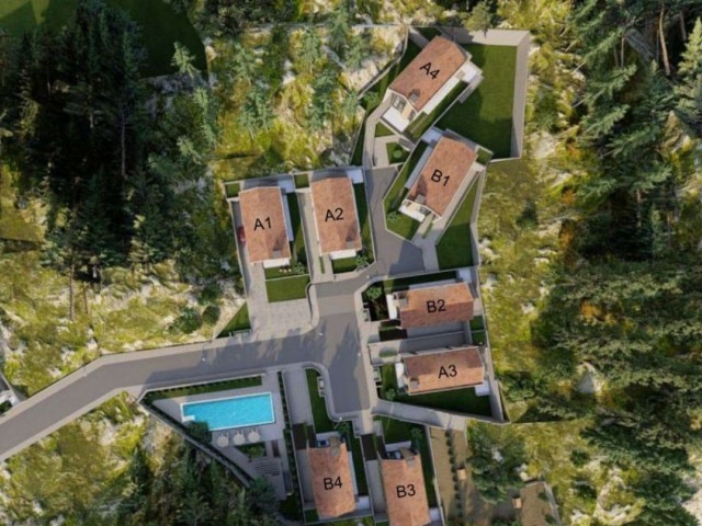 Luxusvillen mit Gemeinschaftspool und Bergmeerblick in erhöhter Lage in Karaağaç.