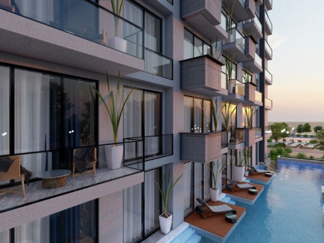 PRIVATE BEACH FLATS FOR SALE IN LEFKE GAZİVEREND FROM A SEAFRONT PROJECT