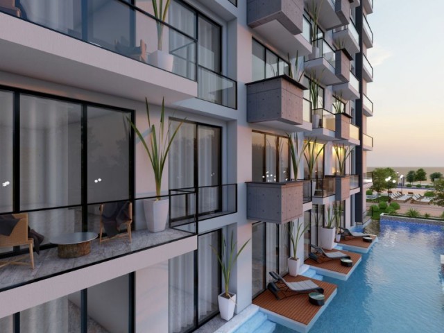 PRIVATE BEACH FLATS FOR SALE IN LEFKE GAZİVEREND FROM A SEAFRONT PROJECT