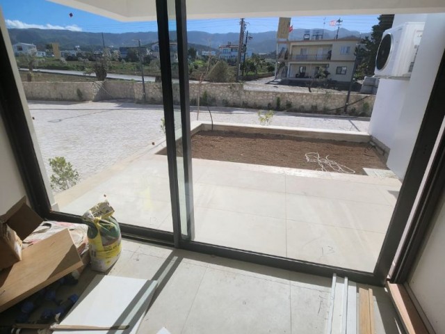 3+1 loft with garden for sale in a site with a private beach