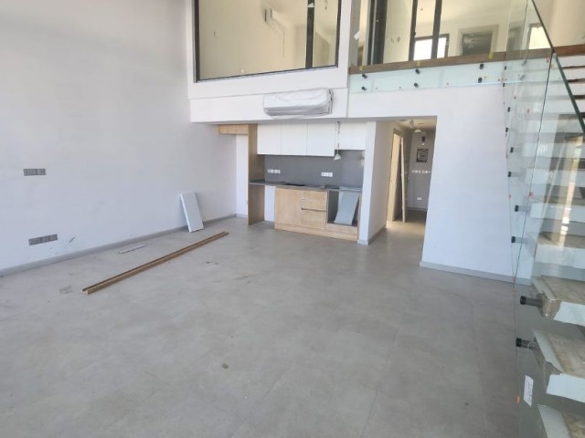 3+1 loft with garden for sale in a site with a private beach