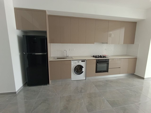 2+1 fully furnished flat for sale in Kyrenia Çatalköy, with its own terrace and tenant ready.