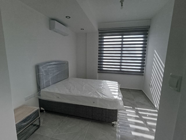 2+1 voll möblierte Wohnung zum Verkauf in Kyrenia Çatalköy, mit eigener Terrasse und mieterbereit.