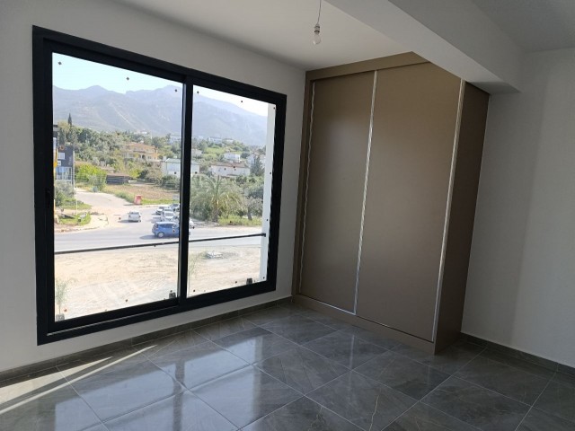 2+1 brand new flat for sale with commercial permit and its own terrace, on the main road in Kyrenia Çatalköy.