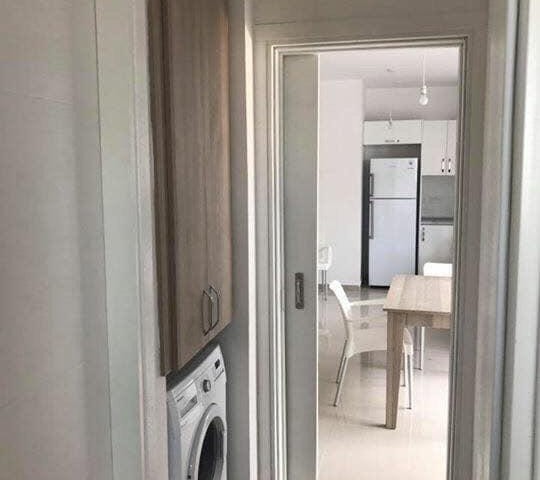 Girne Merkez'de 2+1 kiralık yeni apartman dairesi. 05338445618