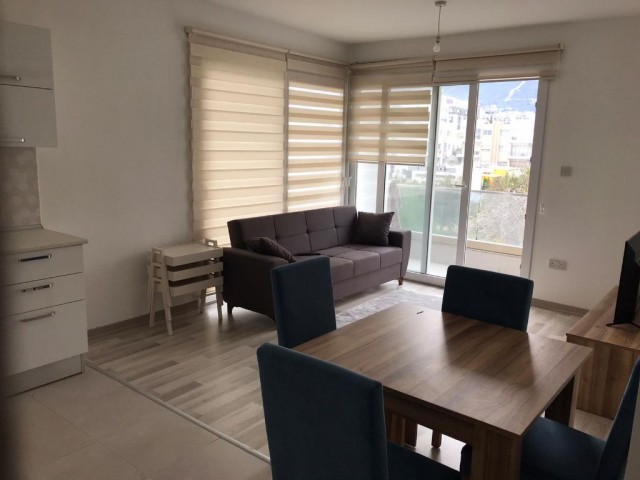 1+1 fully furnished apartment for rent in one of the best quality buildings in the market that has proven itself in the old astro market in the center of girne. . .  400 STG 05338445618 ** 