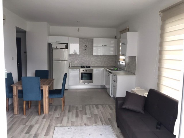 1+1 fully furnished apartment for rent in one of the best quality buildings in the market that has proven itself in the old astro market in the center of girne. . .  400 STG 05338445618 ** 