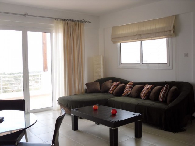 Two Bedroom Top Floor Apartment with Private Roof Terrace in Tatlısu near Magusa. Ref: TU539