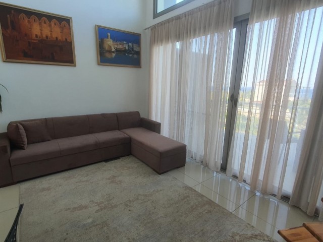 Girne lapta bölgesinde denize yakın kiralık  2+1 luks daire