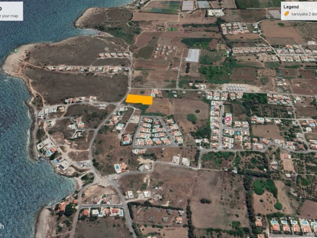 2 acres of 1 evlek land for sale in Karşıyaka, very close to the sea