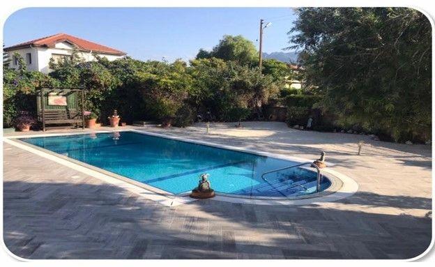 Steps Away From The Beach This Modern & Upgraded Villa Is In A Secluded, Quiet & Sought-After Area Of Alsancak. It Boasts Fabulous Views Of Both The Majestic Mountain Range & The Med