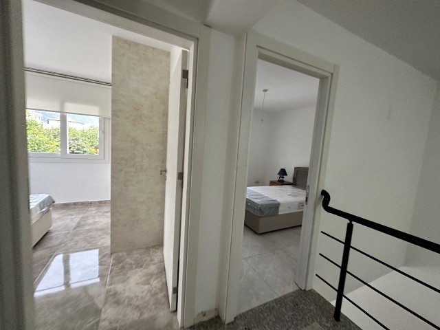 3+1 GROUND FLOOR DUPLEX WITH LARGE GARDEN AND SHARED POOL IN GIRNE ALSANCAK AREA