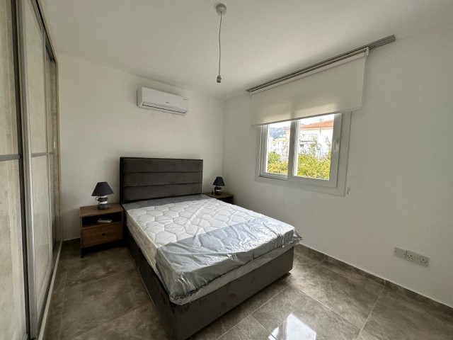 3+1 DUPLEX-WOHNUNG MIT GARTEN UND GEMEINSCHAFTSPOOL IN GIRNE / ALSANCAK