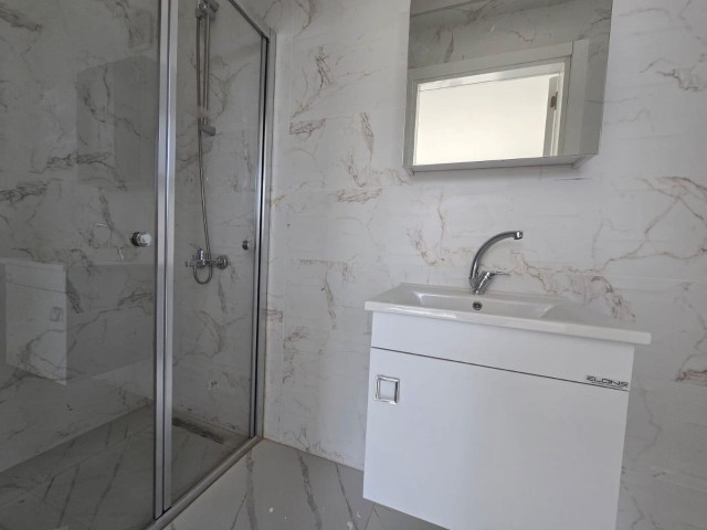 NEW ENSUITE 3+1 FLAT WITH MOUNTAIN AND SEA VIEWS IN GIRNE ALSANCAK AREA