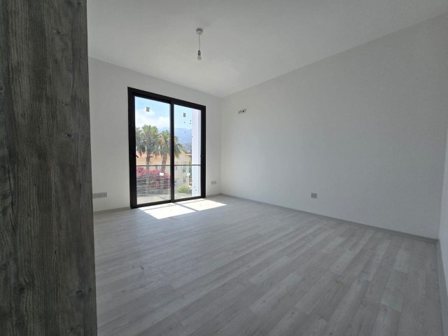 NEW ENSUITE 3+1 FLAT WITH MOUNTAIN AND SEA VIEWS IN GIRNE ALSANCAK AREA