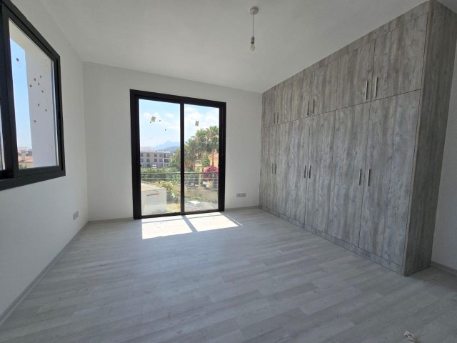 NEW ENSUITE 3+1 FLAT WITH MOUNTAIN AND SEA VIEWS IN GIRNE ALSANCAK AREA