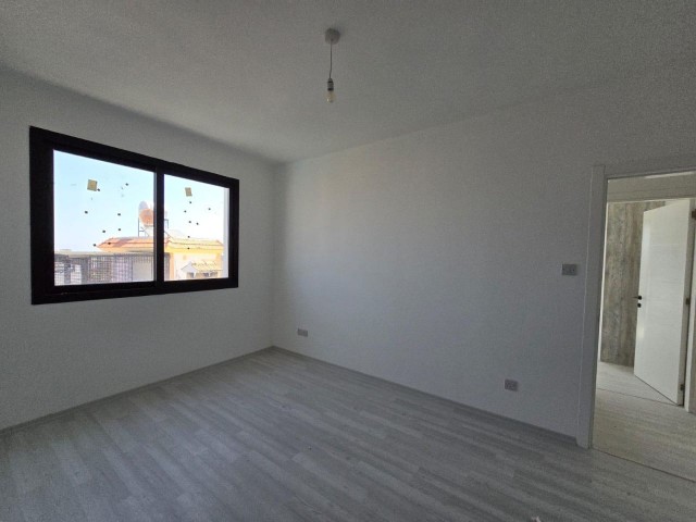 NEW ENSUITE 3+1 FLAT WITH MOUNTAIN AND SEA VIEWS IN GIRNE ALSANCAK AREA