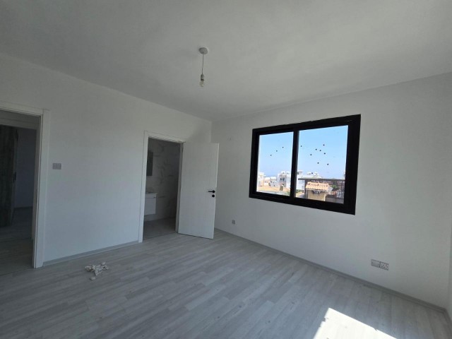 NEW ENSUITE 3+1 FLAT WITH MOUNTAIN AND SEA VIEWS IN GIRNE ALSANCAK AREA