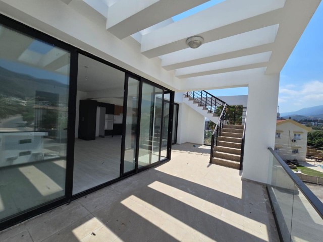 NEW ENSUITE 3+1 FLAT WITH MOUNTAIN AND SEA VIEWS IN GIRNE ALSANCAK AREA