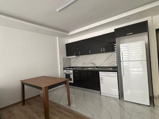 GİRNE MERKEZDE MÜKEMMEL DAG MANZARALI 2+1 SATILIK DAİRE