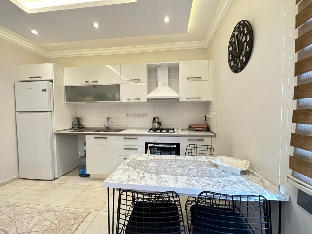 1+1 FLAT FOR SALE IN KYRENIA CENTER WITH MOUNTAIN SEA VIEW